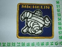 Ecusson Brodé Bonhomme Michelin - Neuf - Dimensions: 7,5 * 7,5 Cm -  Années 70 - Ref 9599 - Botones