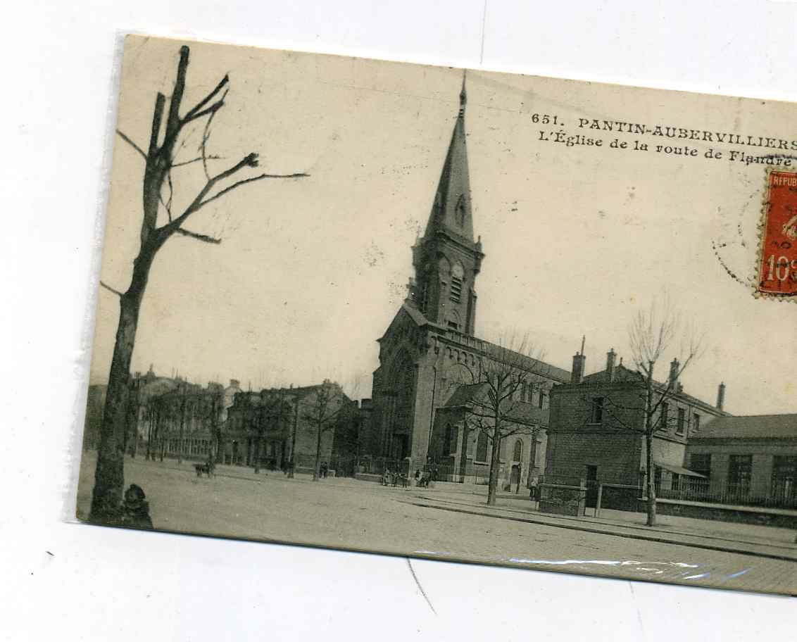 93 - PANTIN - AUBERVILLIERS - LA ROUTE DE FLANDRE ET L´EGLISE N°651 - Aubervilliers