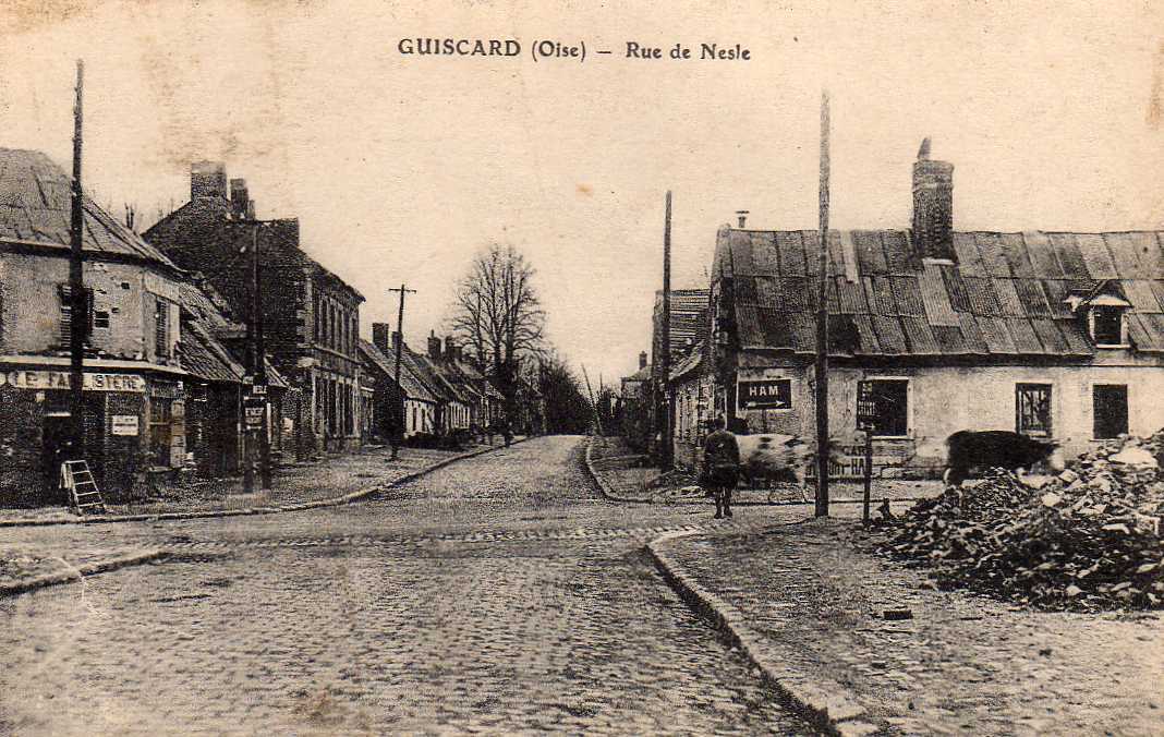 60 GUISCARD Rue De Nesle, Animée, Panneau Ham, Vaches, Ed Combier, 191? - Guiscard
