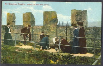 Group Kissing The Blarney Stone, Ireland, U.K. - Cork