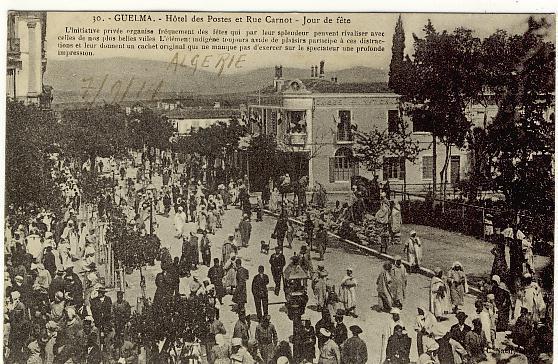 Guelma Hotel Des Postes Et Rue Carnot Jour De Fete Voyagé Guelma Sept 1914 - Guelma