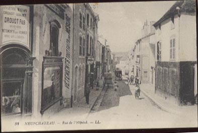 Neuchâteau Rue De L'hopital , Magasin Drouot Animée - Neufchateau