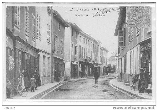 01 // AIN / MONTLUEL / Grande Rue / Animée / - Montluel