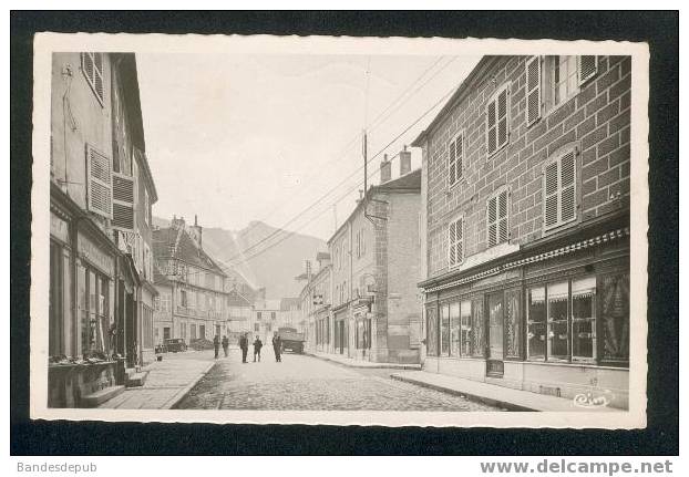 CPSM - Poligny - La Grande Rue ( Animée CIM ) - Poligny