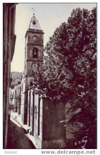 L'eglise Avec Sa Tour Carree Et La Rue De L'Horloge - Le Vigan