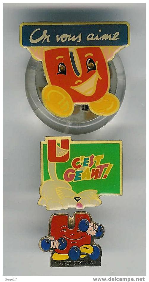 3 Pin´s  Magasins "U" Dont 1 Clignotant - Loten