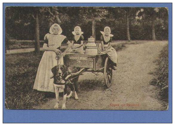 Postkaart "Groeten Uit Holland" Vrouw Met Hondenkar "Melkkar" MIDDELBRUG - Shopkeepers