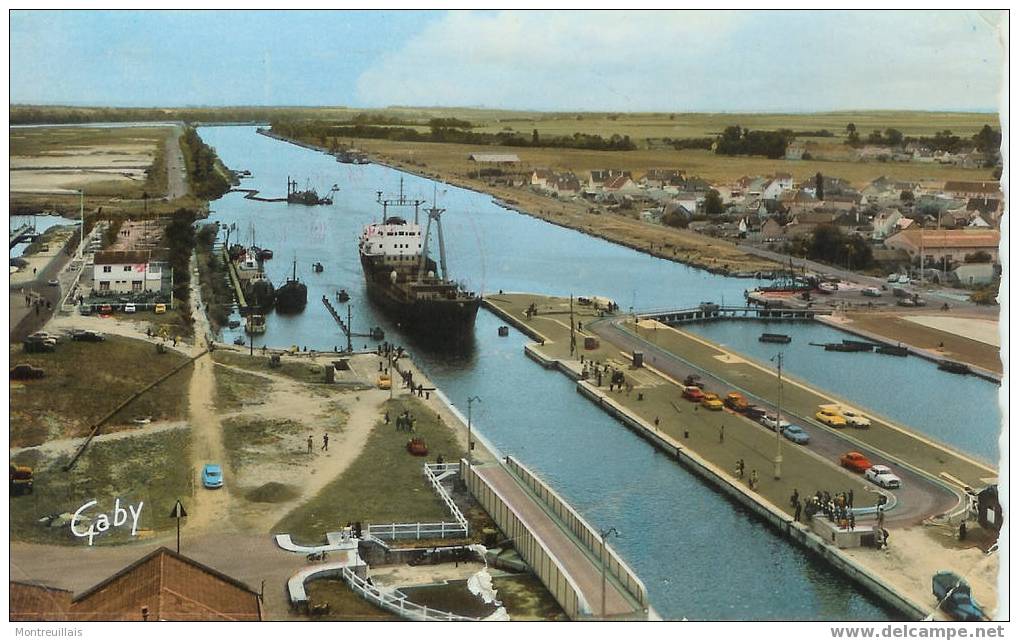 Le Port Et Le Canal De L'Orne OUISTREHAM RIVA-BELLA Carte Colorisée Dentelée Timbrée Verso - Riva Bella