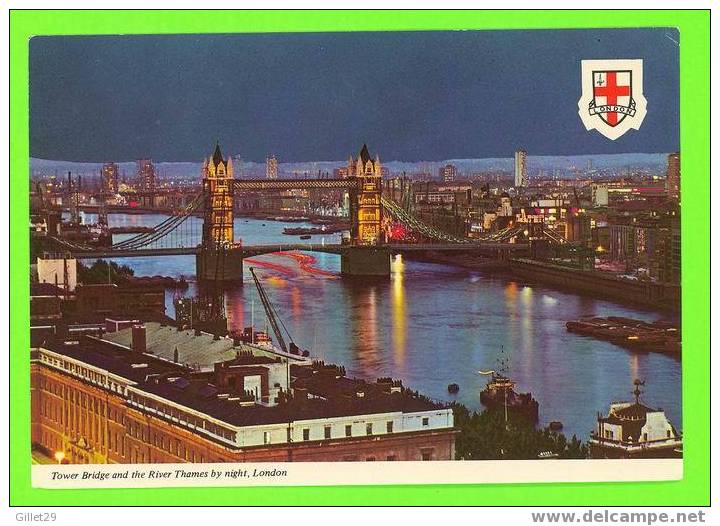 LONDON, UK - TOWER BRIDGE  AND THE RIVER THAMES BY NIGHT - - River Thames