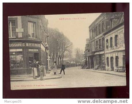 61 Gacé Rue De Lisieux édit.taranne Bunel N°1148 Animée Magasin Au Petit Paris , Café Belle Carte - Gace