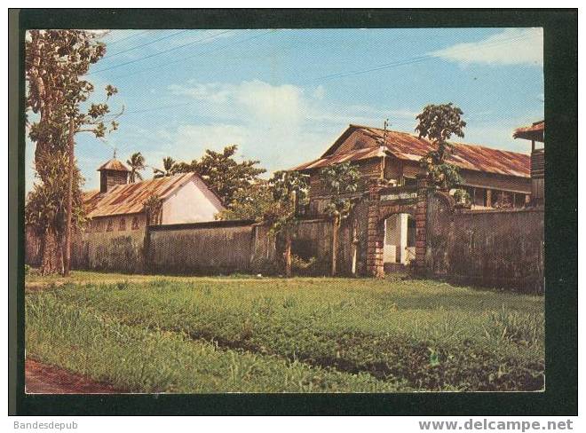 CPSM - Guyane Française - Saint Laurent Du Maroni - Entrée De L'ancien Pénitencier ( Ed. Caraïbes ) - Saint Laurent Du Maroni