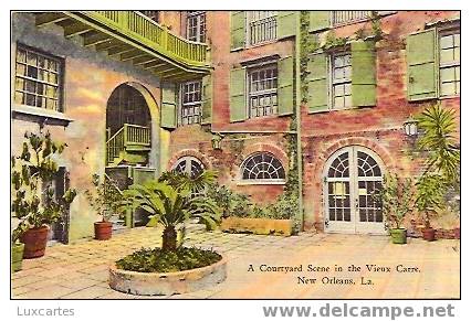 A COURTYARD SCENE IN THE VIEUX CARRE . NEW ORLEANS. LA. - New Orleans