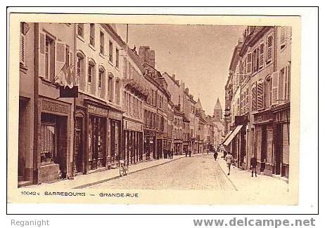 57 SARREBOURG !!! CPA 741 !!! Gran Rue Commerce TOP - Sarrebourg