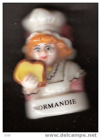 Fève " NORMANDIE " Boulangère Ou Pâtissière Avec Brioche  ; TB - Regioni