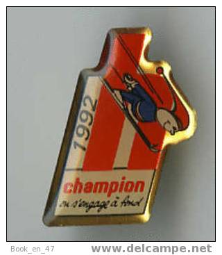 {48846} Pin´s " Champion S´ Engage à Fond 1992 , Saut à Ski " ( Lettre H ), TBE . - Sports D'hiver