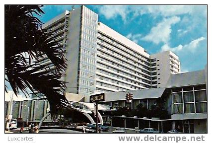 DEAUVILLE HOTEL ON COLLINS AVENUE AND THE ATLANTIC OCEAN . MIAMI BEACH . - Miami Beach