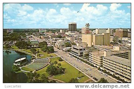 A VIEW OF THE LAKE EOLA BANDSHELL AND DOWNTOWN ORLANDO . FLORIDA . - Orlando