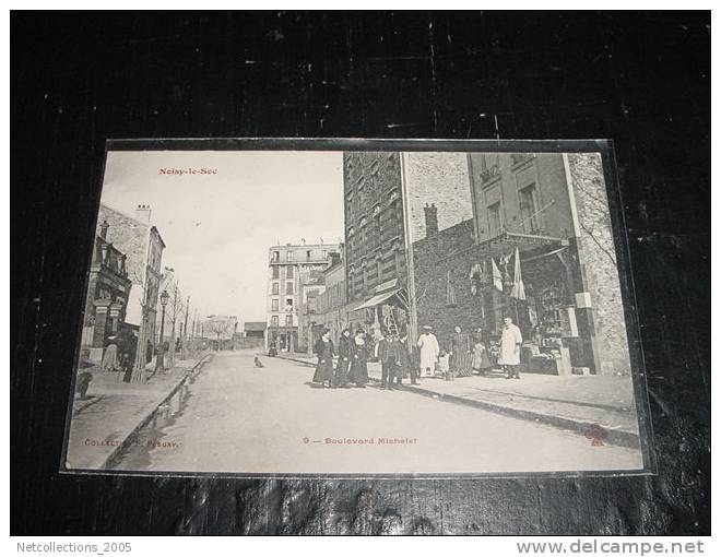 NOSY-LE-SEC - 9 BOULEVARD MICHELET - MAGASIN + GENS ET ENFANTS - 93 SEINE SAINT DENIS - Carte Postale De France - Noisy Le Sec