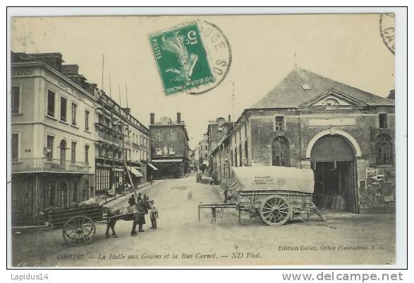 D 657/ CPA ORBEC (calvados) LA HALLE AUX GRAINS ET LA RUE CARNOT - Orbec