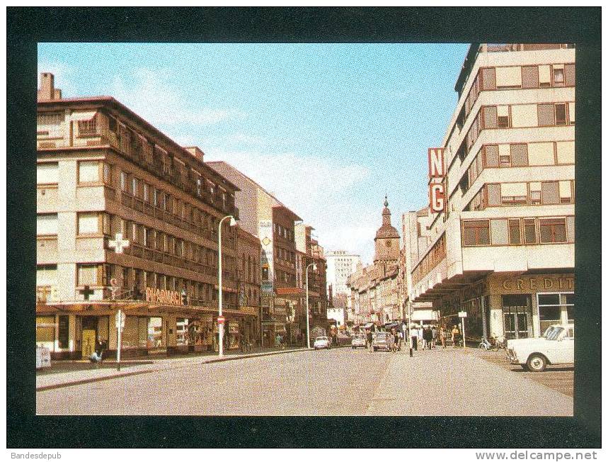 CPSM - Thionville (57) - Rue De Paris - Les Nouvelles Galeries ( Automobile Pharmacie Ed. POLL OLLAND 623) - Thionville