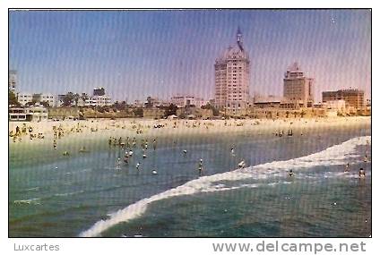 BATHING IN THE BEAUTIFUL PACIFIC COAST CLUB AS BACKGROUND,LONG BEACH.CALIFORNIA. - Long Beach