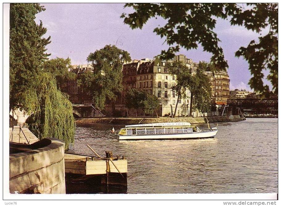PARIS -  La Seine -  L´ILE De La CITE Et Le Bâteau-Mouche - Die Seine Und Ihre Ufer