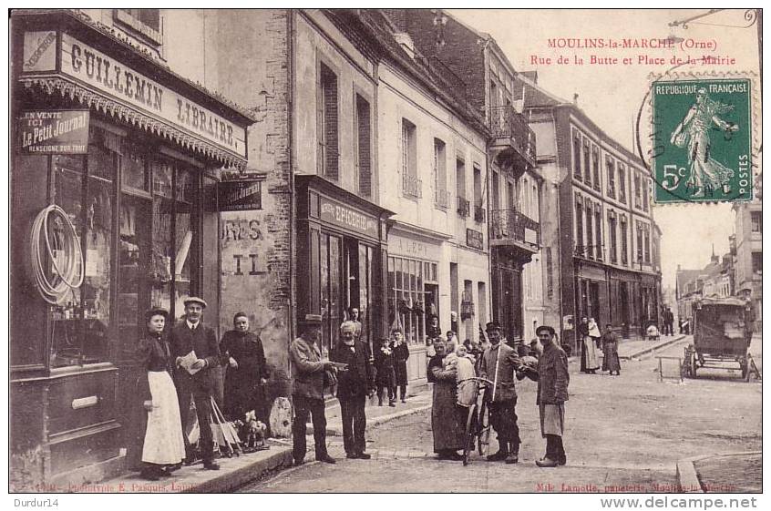 MOULINS-la-MARCHE (Orne).   Rue De La Butte Et Place De La Mairie (bp Commerces / TOP Belle Carte Animée / E.PASQUIS) - Moulins La Marche