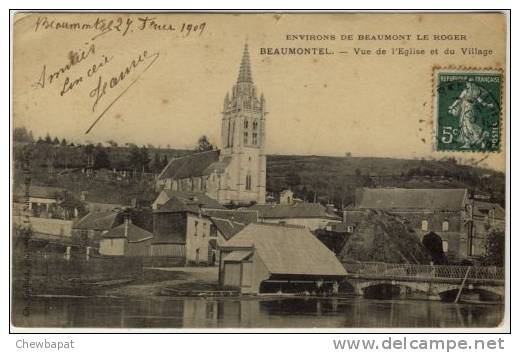 Beaumontel - Vue De L' Eglise Et Du Village - Beaumont-le-Roger