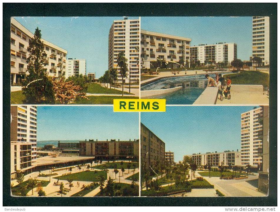 CPSM - Reims (51) - Multivues ( Centre Commercial Quartier De L'Europe Cité HLM Barre H.L.M. LA CIGOGNE) - Reims