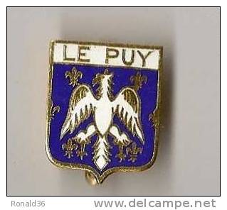 BROCHE DE " LE PUY " émaillé Blanche Et Bleu ( Fleur De Lyse) - Brooches