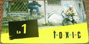 Latvia , Lettland , Lettonia - BOY WITH BMX BIKE -TOXIC- PREPAID USED CARD-1Ls A Graffiti Artist - Letland