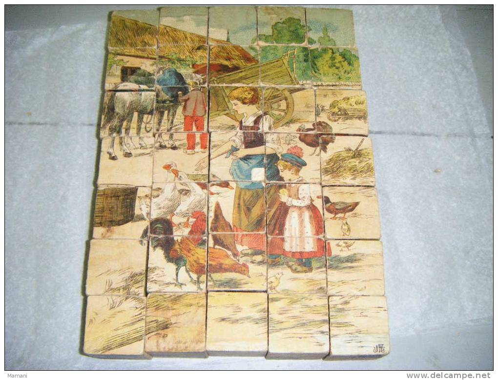 coffret de  35 cubes en bois type puzzle signe jf-fermiere-----charrette- volaille-cigogne-gendarme -train-cerise etc..