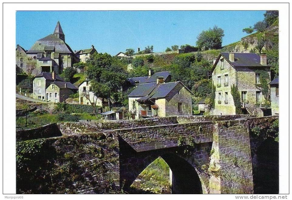 CPM De Treignac   Aperçu Sur Le Vieux Pont Et L Eglise XII Et XIV ème - Treignac