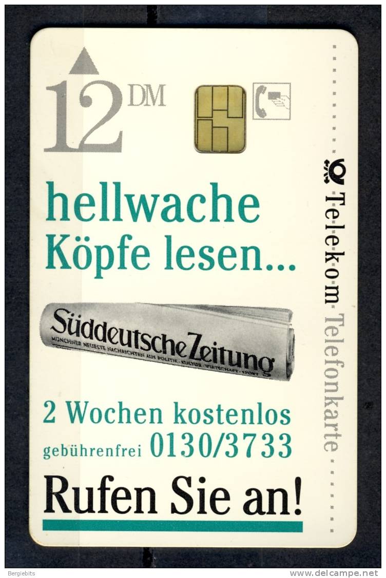 1994 German Telekom Telefonkarte 12 DM,used. Sueddeutsche Zeitung - A + AD-Series : D. Telekom AG Advertisement