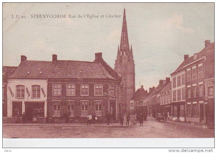 59.119/ STEENVOORDE - Rue De L'église Et Clocher - Steenvoorde