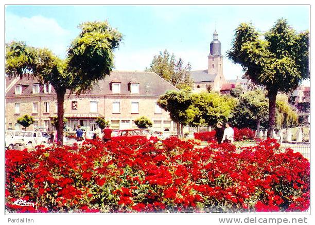 61.  PUTANGES-PONT-ECREPIN. VILLAGE FLEURI. "HÔTEL RESTAURANT DU LION VERT". L'EGLISE. - Putanges