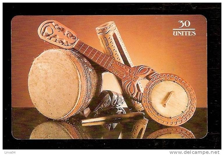 TÉLÉCARTE POLYNÉSIE FRANCAISE  30 UNITÉS-  N° 50 - UTILISÉE - BON ÉTAT GÉNÉRAL- INSTRUMENTS DE MUSIQUE - Frans-Polynesië