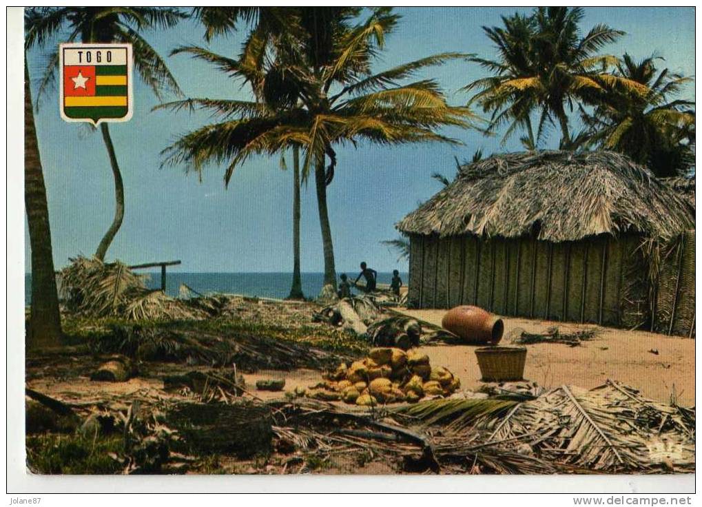 CPM    TOGO       VILLAGE AU BORD DE MER             1987 - Togo