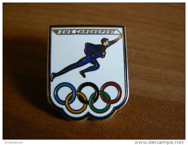 PIN´S ARTHUS BERTRAND LA POSTE PTT EMS CHRONOPOST JEUX OLYMPIQUES ANNEAUX - Arthus Bertrand