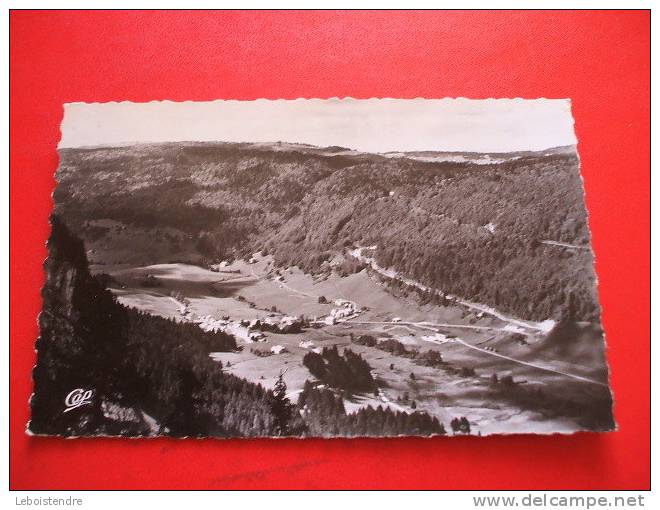 CPSM   01  AIN   GEX LA FAUCILLE  LA VALLEE DE MIJOUX VUE DU COL DE LA FAUCILLE  VOYAGEE 1962 TIMBRE - Gex