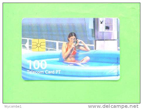 PORTUGAL - Chip Phonecard/Girl In Pool Using Phone - Portugal