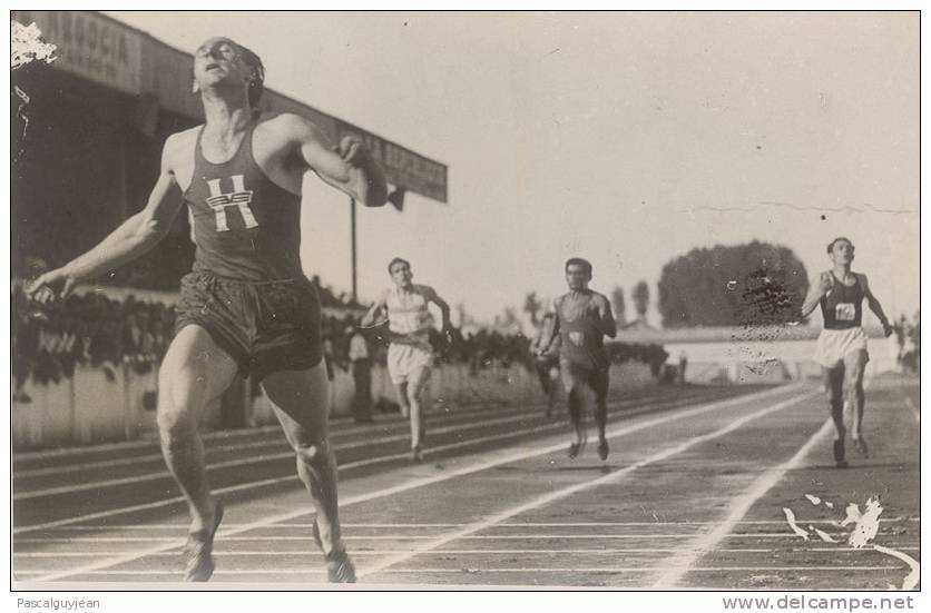 PHOTO ATHLETISME - TOULOUSE - ARRIVEE D'OLSON DANS LE 400 M - Athlétisme