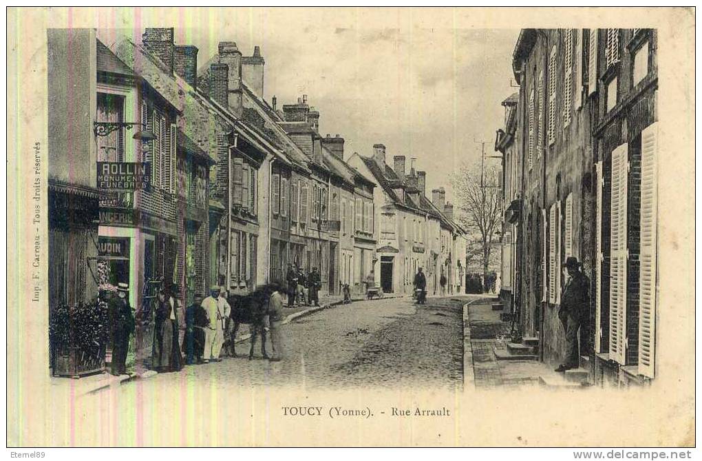 CPA 89 TOUCY- RUE ARRAULT 1907 - COMMERCES ANIMME - MONUMENTS FUNEBRES ROLLIN - Winkels