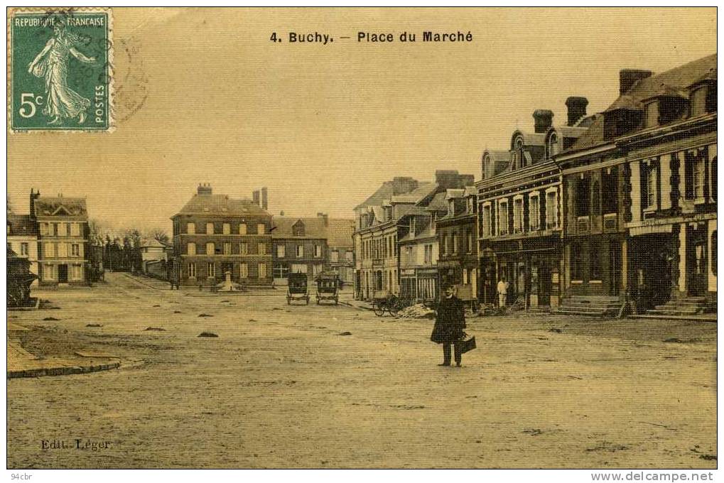 CPA (76);  BUCHY Place Du Marché (edition Toilée) Leger Defaut Coin Haut Gauche - Buchy