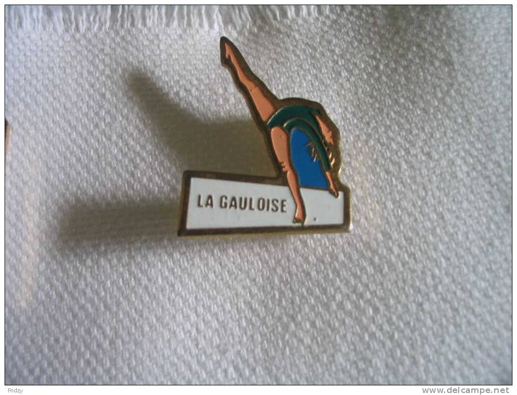 Pin's Gymnastique "La Gauloise". Club De Montbeliard - Gymnastics