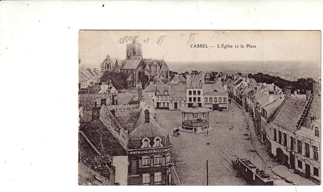 Cpa CASSEL  L´Eglise Et La Place " A LA NOUVELLE POMME D OR "  Tram ELD - Cassel