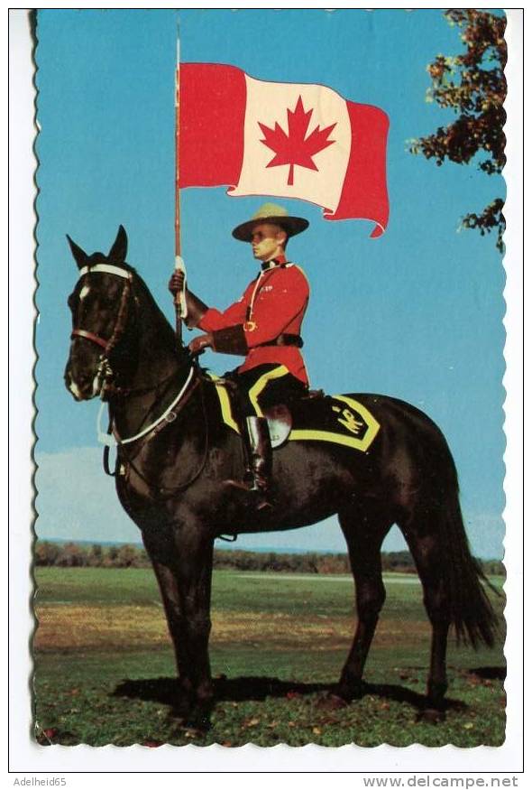 Greetings From Lloydminster Alberta-Saskatchewan Mountie With (fake) Canadian Flag On Horse - Autres & Non Classés