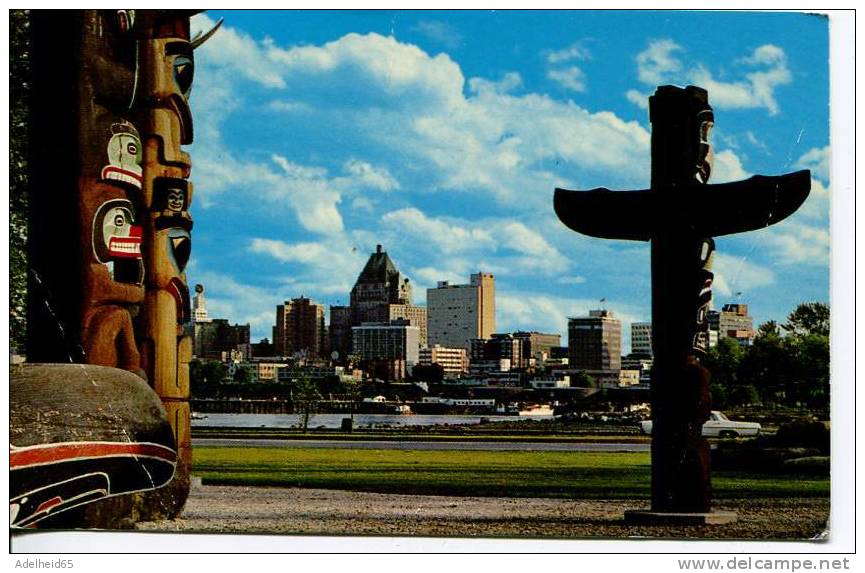 Totem Poles And Skyline, Vancouver B.C. - Vancouver