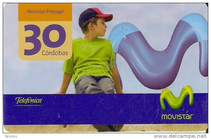 TARJETA DE NICARAGUA DE MOVISTAR MOVIL 30 CORDOBAS NIÑO SENTADO (BRILLO) (con Pequeña Marca) - Nicaragua