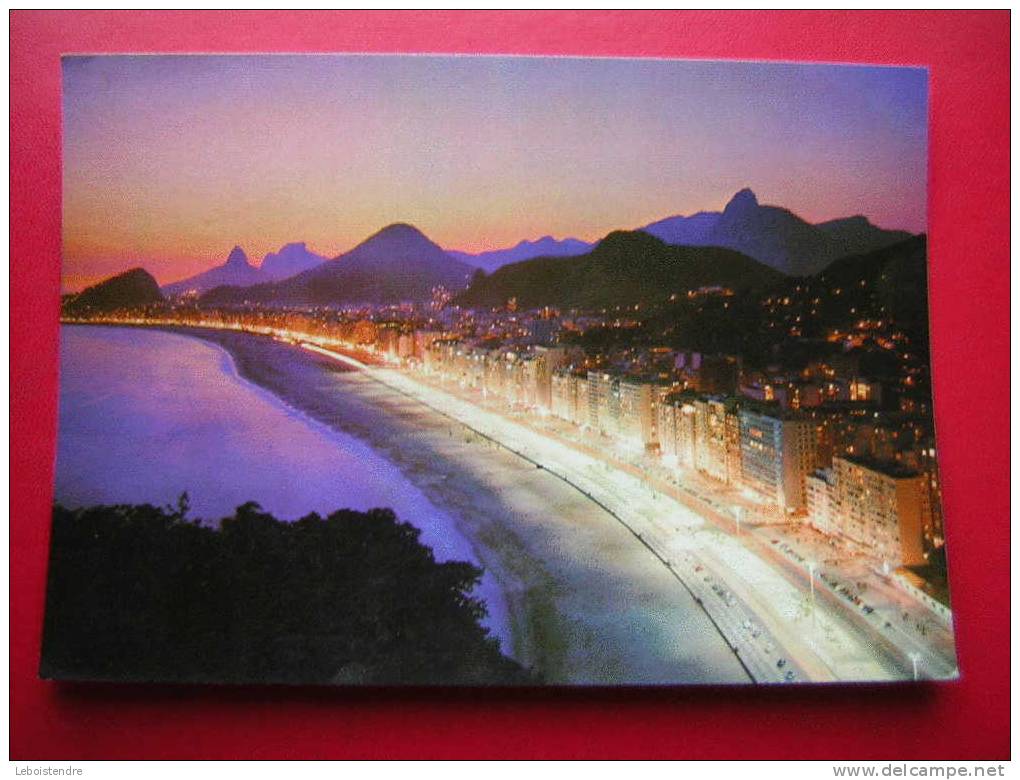 CPM-BRESIL-BRASIL-RIO DE JANEIRO-VISTA NOTURNA DE COPACABANA-PHOTO RECTO /VERSO-VOYAGEE 1973 - Copacabana